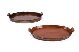 A COOPERED MAHOGANY AND BRASS BOUND OVAL TRAY, EARLY 19TH CENTURY, AND ANOTHER SIMILAR
