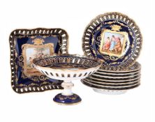 A VIENNA-STYLE BLUE-GROUND AND GILT PORCELAIN PART DESSERT SERVICE, FIRST QUARTER 20TH CENTURY