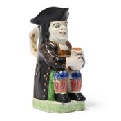A BRITISH POTTERY SPONGE-DECORATED TOBY JUG, POSSIBLY SCOTTISH, CIRCA 1830