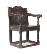 A COMMONWEALTH OAK PANEL BACK ARMCHAIR, CIRCA 1650