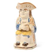 A STAFFORDSHIRE CREAMWARE PRATT-TYPE TOBY JUG, LATE 18TH CENTURY