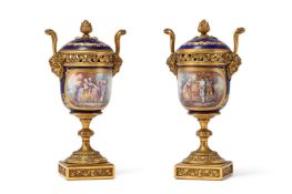 A PAIR OF FRENCH ORMOLU MOUNTED PORCELAIN POT POURRI VASES WITH PANELS BY L SCHILT, 19TH CENTURY
