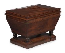A WILLIAM IV MAHOGANY SARCOPHAGUS CELLARET, CIRCA 1835