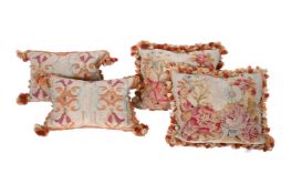 A MATCHING SET OF FOUR AUBUSSON TYPE CUSHIONS, CONSTRUCTED FROM 19TH CENTURY TAPESTRY