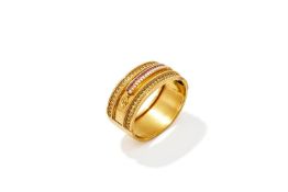 AN ARCHAEOLOGICAL REVIVAL RUBY AND SPLIT PEARL BANGLE