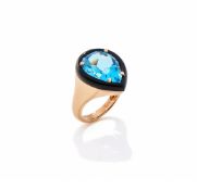 A BLUE TOPAZ AND ONYX DRESS RING