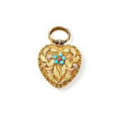 AN EARLY 19TH CENTURY TURQUOISE AND RUBY SET HEART SHAPED LOCKET