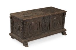A NORTH ITALIAN CARVED WALNUT CASSONE, PROBABLY HAPSBURG, LATE 16TH OR 17TH CENTURY