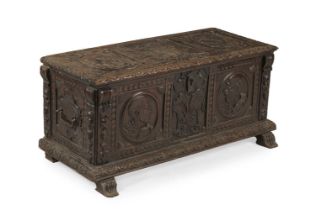 A NORTH ITALIAN CARVED WALNUT CASSONE, PROBABLY HAPSBURG, LATE 16TH OR 17TH CENTURY AND LATER