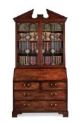 A FINE GEORGE III MAHOGANY BUREAU BOOKCASE, IN THE MANNER OF THOMAS CHIPPENDALE, CIRCA 1770