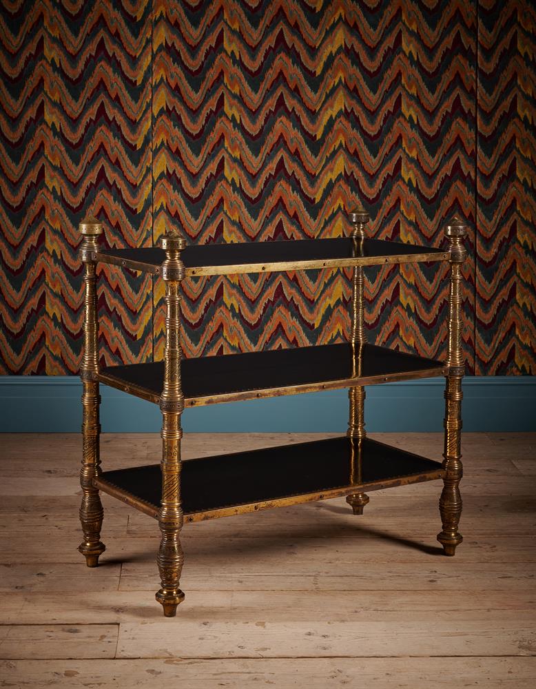 AN UNUSUAL AESTHETIC MOVEMENT EBONISED AND ENGRAVED GILT BRASS THREE TIER ETAGERE