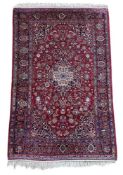 A KASHAN SILK RUG, CIRCA 1920