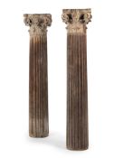 A LARGE PAIR OF CARVED OAK AND PITCH PINE CORINTHIAN COLUMS, PROBABLY LATE 18TH CENTURY