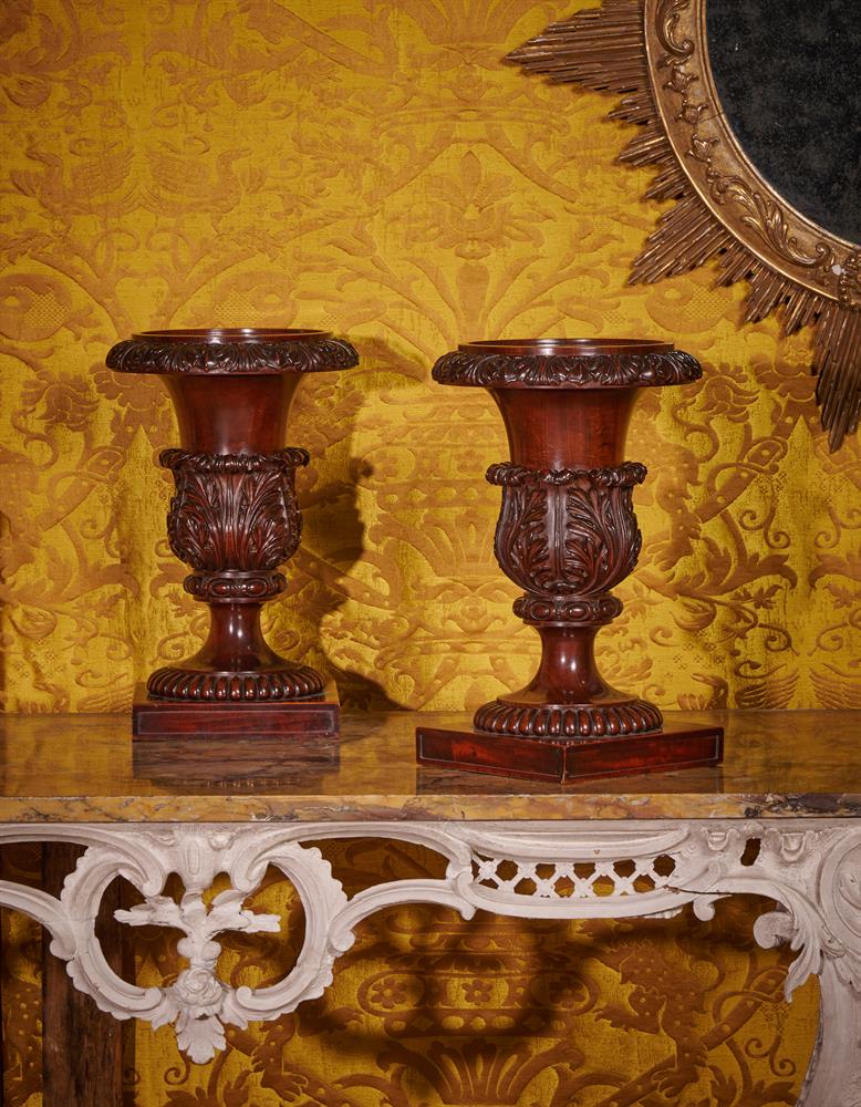 A PAIR OF REGENCY SOLID CARVED MAHOGANY VASES OR STANDS, ATTRIBUTED TO GILLOWS, CIRCA 1820