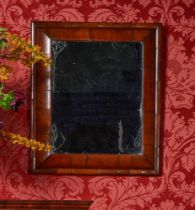 A WILLIAM & MARY WALNUT CUSHION MIRROR, CIRCA 1690