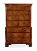 A GEORGE II WALNUT AND FEATHERBANDED CHEST ON CHEST, CIRCA 1730