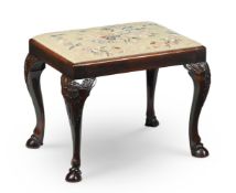 A GEORGE III MAHOGANY AND NEEDLEWORK UPHOLSTERED STOOL, CIRCA 1770