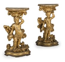 A PAIR OF ITALIAN CARVED GILTWOOD FIGURAL CONSOLE TABLES, EARLY 18TH CENTURY