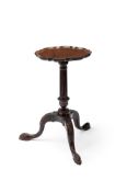 A GEORGE II MAHOGANY PIECRUST CANDLE STAND, IN THE MANNER OF THOMAS CHIPPENDALE, CIRCA 1750