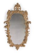 A GEORGE II CARVED GILTWOOD MIRROR, CIRCA 1755