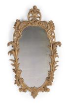 A GEORGE II CARVED GILTWOOD MIRROR, CIRCA 1755