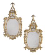 A LARGE PAIR OF CARVED GILTWOOD MIRRORS, IN THE MANNER OF THOMAS CHIPPENDALE, 18TH OR 19TH CENTURY