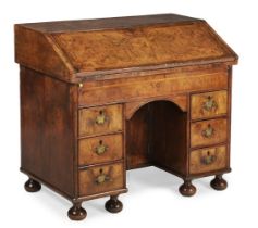 Y A WILLIAM & MARY FIGURED WALNUT AND FEATHERBANDED BUREAU, CIRCA 1690