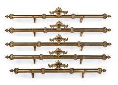 A GROUP OF FIVE LARGE BRASS TAPESTRY POLES OR PELMETS, IN REGENCY STYLE, CONTEMPORARY