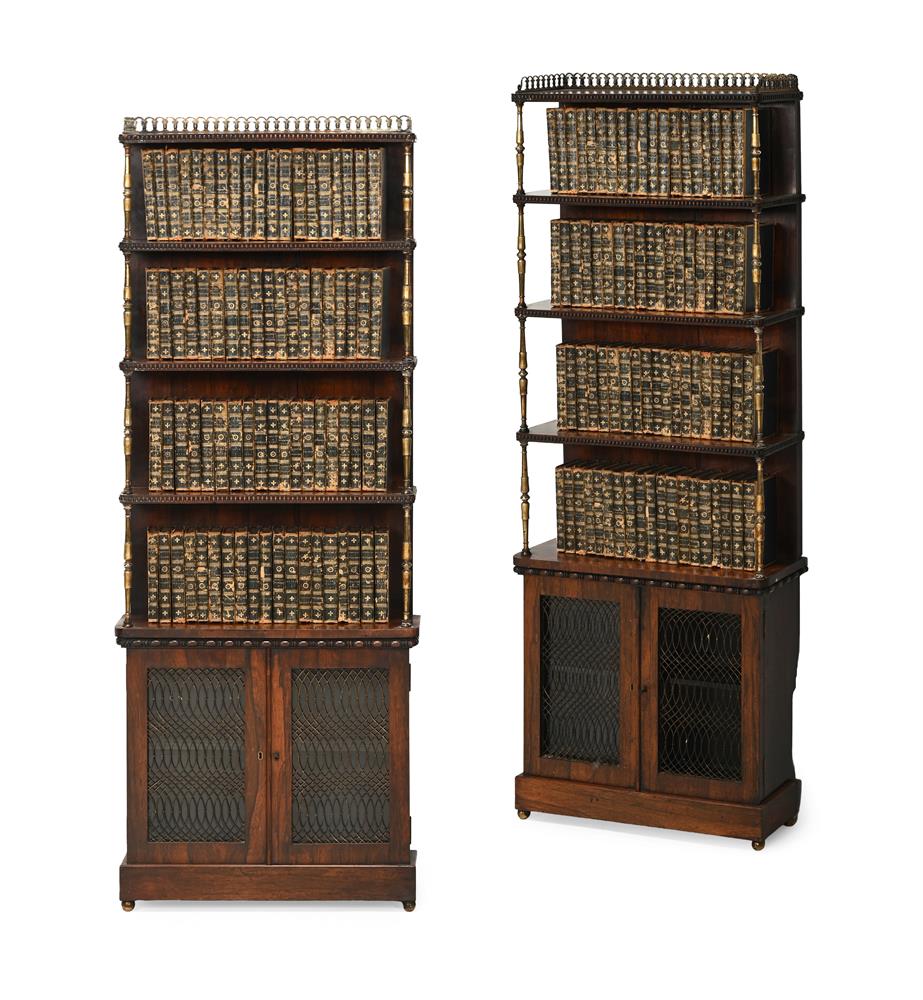 AN UNUSUAL PAIR OF REGENCY ROSEWOOD AND GILT METAL MOUNTED OPEN BOOKCASES, CIRCA 1820