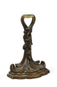 A VICTORIAN BRONZE DOOR STOP OR DOOR PORTER, MID 19TH CENTURY