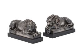 AFTER ANTONIO CANOVA, A PAIR OF FRENCH SILVERED BRONZE REZZONICO LIONS, MID TO EARLY 19TH CENTURY