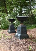 A PAIR OF VICTORIAN PAINTED CAST IRON PLANTERS ON ORIGINAL PEDESTALS, LATE 19TH CENTURY