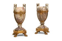 A LARGE PAIR OF GILT METAL MOUNTED BRECHE VIOLET MARBLE URNS, 19TH CENTURY