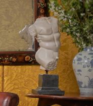 AFTER THE ANTIQUE, A CARVED MARBLE MALE TORSO, 20TH CENTURY