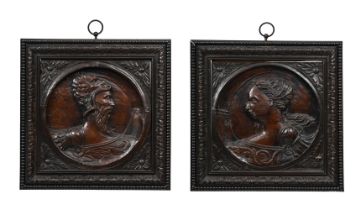 A RARE PAIR OF FRENCH CARVED WALNUT 'MYTHOLOGICAL ROMAYNE' PANELS, LATE 16TH CENTURY