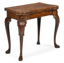 A GEORGE II WALNUT CONCERTINA ACTION CARD TABLE, CIRCA 1730