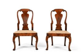 A PAIR OF GEORGE II WALNUT CHAIRS, CIRCA 1735