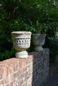 A PAIR OF CARVED LIMESTONE URN PLANTERS, LATE 19TH OR EARLY 20TH CENTURY