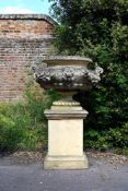 A LARGE COMPOSITION STONE LION MASK URN ON STAND, LATE 20TH CENTURY