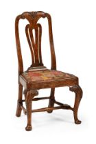 A GEORGE II CARVED WALNUT CHAIR, CIRCA 1740