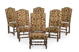 A SET OF SIX WILLIAM & MARY WALNUT AND CREWEL WORK UPHOLSTERED CHAIRS, CIRCA 1690