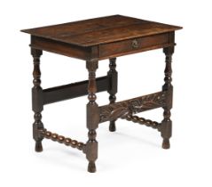 A RARE AND UNUSUAL CHARLES II CARVED 'RED' WALNUT CENTRE OR SIDE TABLE, CIRCA 1670