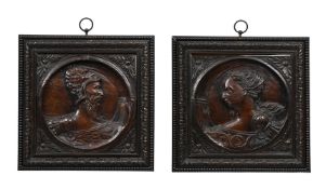 A RARE PAIR OF FRENCH CARVED WALNUT 'MYTHOLOGICAL ROMAYNE' PANELS, LATE 16TH CENTURY
