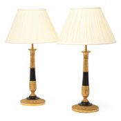 A PAIR OF GILT AND PATINATED BRONZE CANDLESTICK TABLE LIGHTS, EARLY 19TH CENTURY