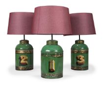 A SET OF THREE TOLE PEINTE TEA CANNISTER TABLE LAMPS, LATE 19TH OR EARLY 20TH CENTURY