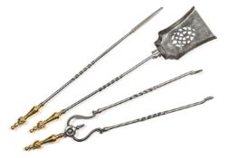 A SET OF THREE BRASS HANDLED POLISHED STEEL FIRE TOOLS, FIRST HALF 19TH CENTURY