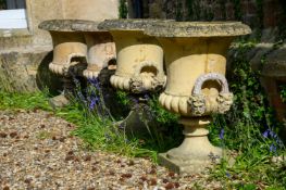 A SET OF FOUR TERRACOTTA COLOURED COMPOSITION STONE CAMPANA URN PLANTERS, 20TH CENTURY