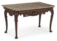 A LOUIS XV CARVED CHESTNUT AND WALNUT CONSOLE OR SIDE TABLE, CIRCA 1750