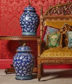 A LARGE PAIR OF CHINESE POWDER BLUE AND POLYCHROME DECORATED VASES AND COVERS, EARLY 19TH CENTURY