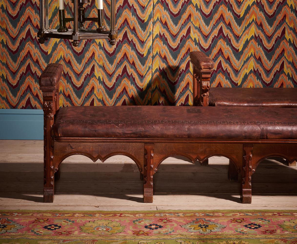 A FINE PAIR OF CARVED OAK GOTHIC REVIVAL HALL BENCHES, IN THE MANNER OF A.W.N. PUGIN, CIRCA 1850